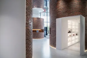 Modern design retail shop showcasing contemporary interior elements with brick and concrete.