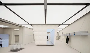 Modern exhibition space with concrete and glass materials