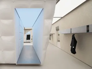 Modern minimalist interior design showcasing a white plastic wall and floor.