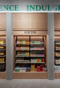 A well-organized retail display featuring a variety of colorful soft drinks.
