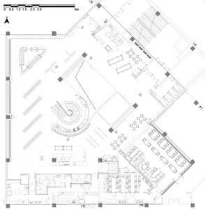 Floor plan of an office space featuring modern materials like steel, glass, and concrete.