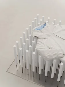 White modern metal rack with cylindrical rods