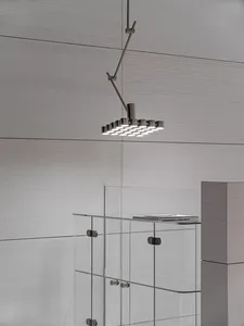 A modern office setting featuring a glass and metal display case.