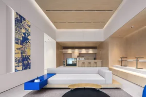 A modern living room featuring wooden elements and contemporary design.