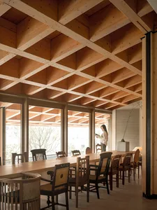 Modern interior design with extensive use of wood materials.
