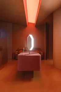 A minimalist bathroom with a glass and metal pedestal sink.