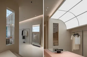 Modern retail clothing shop with glass windows and plaster walls