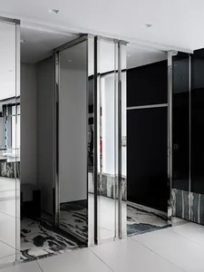 Modern office space featuring clear glass partitions