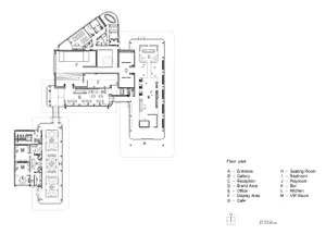 Black-and-white architectural drawing of a commercial interior with various rooms and sections labeled.