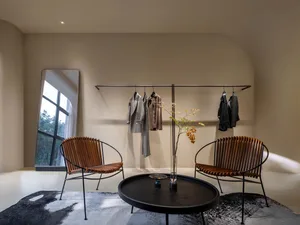 A minimalist casual retail shop featuring an almond-colored coffee table.