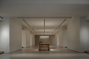 Modern white interior space with minimalist design and unadorned walls and floors.