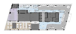 A detailed 2D architectural drawing of a modern office space with various rooms and functional zones.