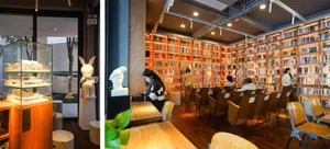 A modern library interior with wooden shelves filled with books.