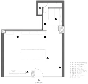 零售空間的2D建築平面圖，包含工作站、陳列架以及衛浴等功能區域。