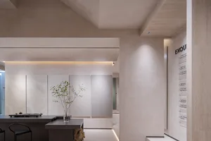 Minimalist coffee shop interior with modern design elements and sleek, minimalist furniture.