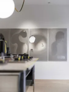 A minimalist kitchen with glass countertops.