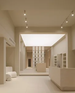 A minimalist staircase constructed from white marble.