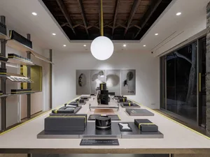 A modern retail storefront showcasing sleek design and glass windows.