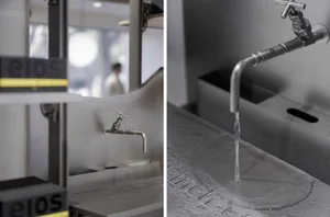 Metallic bathroom faucet and sink design in industrial style