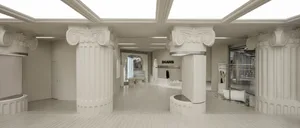 A spacious, modern retail store featuring white plaster columns and stone flooring.