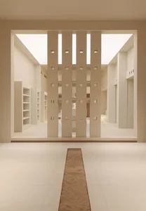極簡建築空間，白色瓷磚地板上排列著混凝土排排。