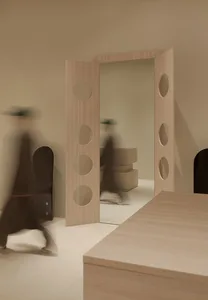 Modern minimalist office space with wood accents.