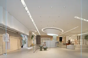 A minimalist retail store with a modern design featuring a neutral color palette and clean lines.