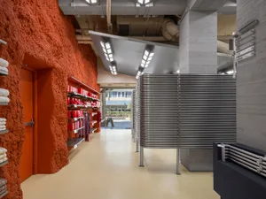 Modern retail store with concrete walls and minimalist design aesthetic