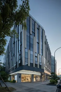 Modern retail storefront with a glass facade and aluminum frame.