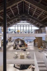An industrial-style retail store with steel and concrete elements.