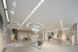 A modern retail store with minimalist design, featuring neutral tones and a spacious layout.