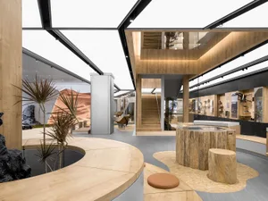 A modern retail storefront with wooden elements and a sleek, minimalist design.