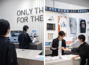 客製T恤印刷的零售空間，展示多款T恤與印刷設備。