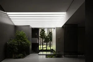 Modern interior design featuring concrete and plant elements