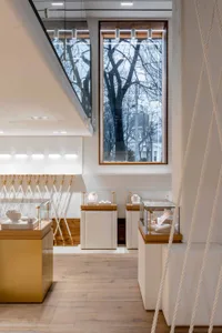 Modern jewelry store with white oak wood interior
