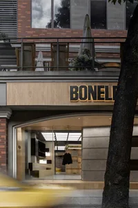 Modern retail storefront featuring a wood exterior