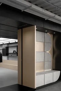 A modern commercial space with concrete and wood features, showcasing contemporary design elements.