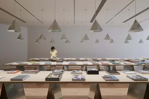 A modern storefront with book displays.