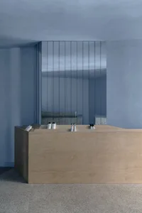 Modern hotel reception desk made of concrete.