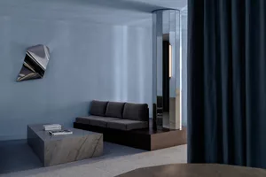 Modern living room featuring metallic furniture and minimalistic design