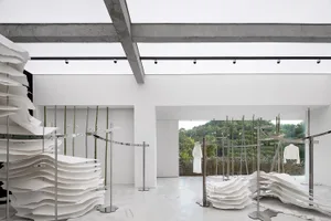 Modern retail space featuring minimalist concrete design