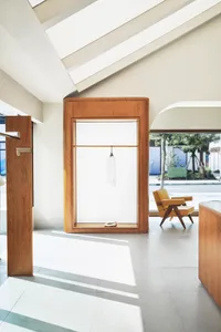 Modern retail storefront with wooden elements