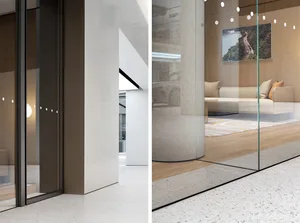 A modern lobby features marble floor and white marble walls.