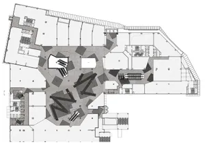 A black and white architectural drawing of a modern office space featuring exposed concrete floors.