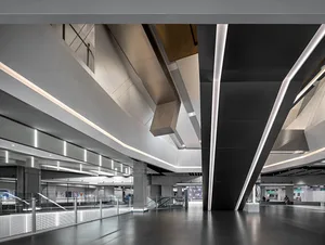 Modern office space featuring industrial features such as steel, concrete, and glass materials.