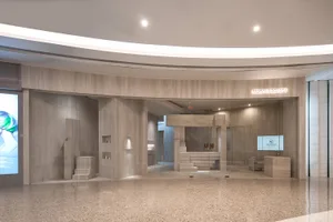 Modern retail storefront featuring glass panels and minimalist design