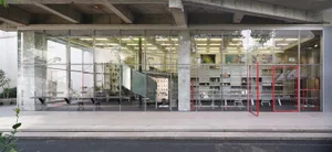 Industrial style commercial space featuring metallic and glass materials.