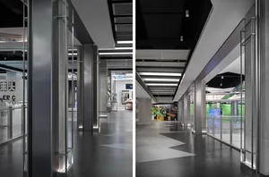 Modern interior space with concrete and glass elements.