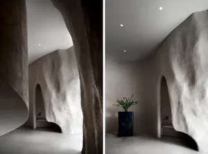 Modern interior design featuring mixed medium materials and abstract shapes for contemporary aesthetic