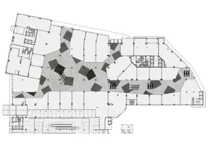 A modern office space with a concrete bluespot floor plan.